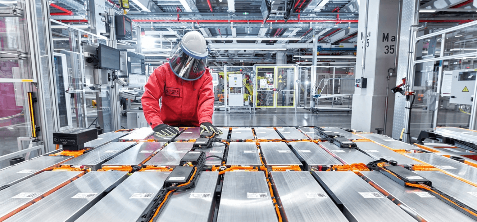 EV battery factory person at work