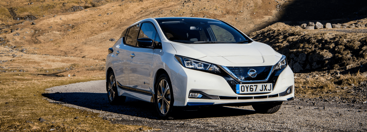 Photo of a white Nissan Leaf electric vehicle