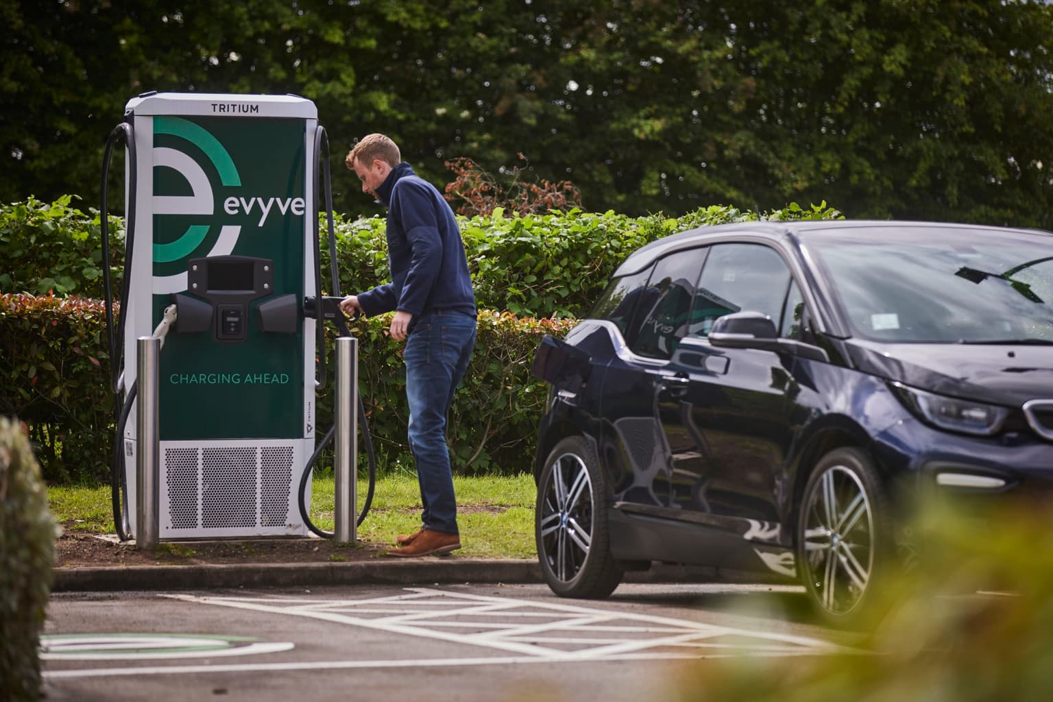 evyve ev charging station being used to charge an ev