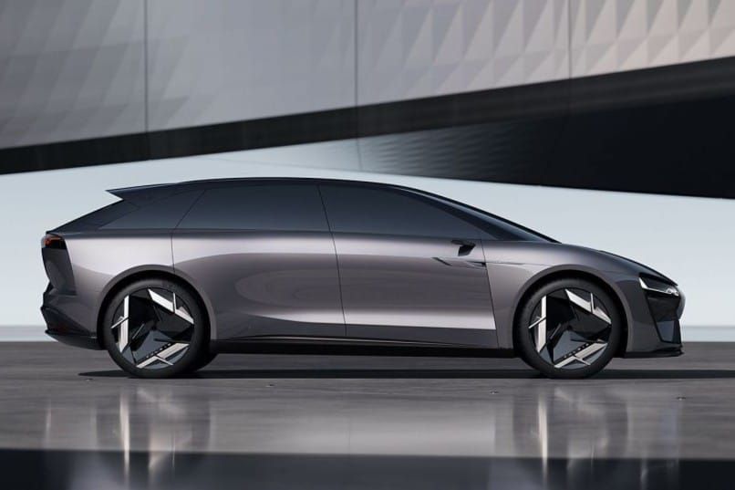 Sleek, modern black sedan with tinted windows, futuristic design, parked on a reflective surface with geometric background.