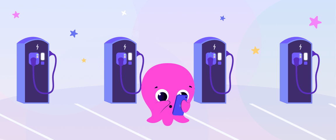 A pink octopus with a phone stands in a parking lot with electric vehicle charging stations under a starry sky.